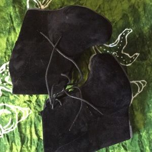 Black Suede heel ankle boots.